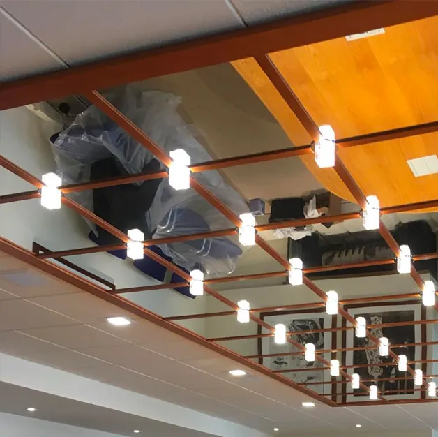 Decorative pendant lighting installed over a staircase